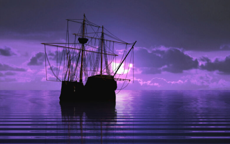 紫がかった空と海の中を走る古い時代の船